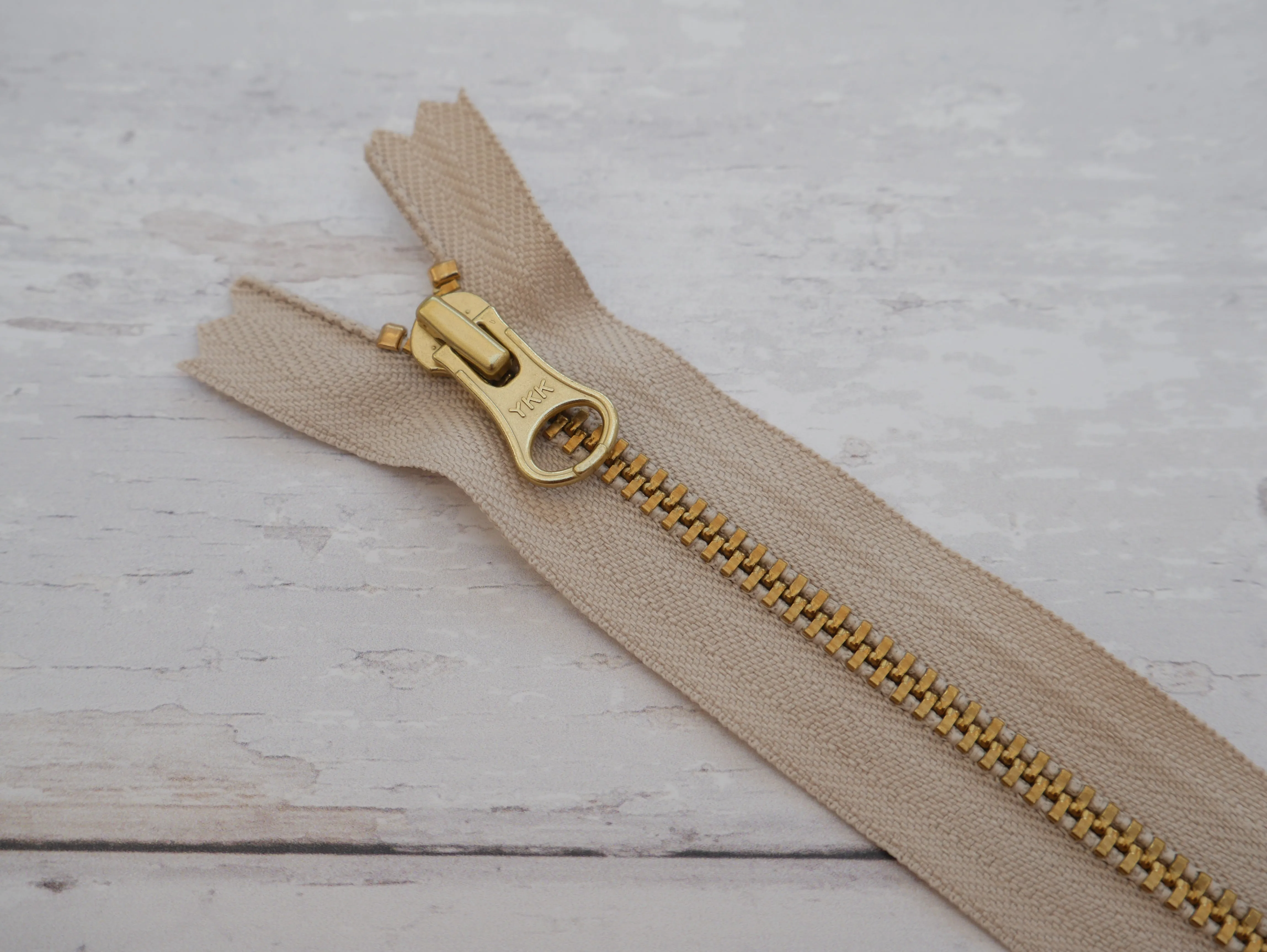 25cm YKK Antique Brass Metal Zip - Oatmeal Tape